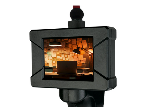 Spy Labs Digital Snake Scope showing a 2.3-inch LCD display with a dimly lit office scene on screen.