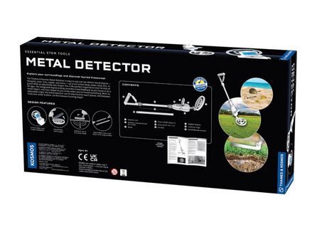 Thames & Kosmos Metal Detector box showing product features and images of detecting metal in sand, dirt, and grass.