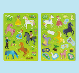Magna Carry | Unicorn Kingdom featuring colorful unicorn and fairy magnetic play pieces on two green foldable boards.