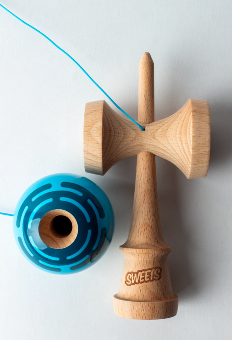 Kendama Prime Radar | Blue with signature Radar mark, Sticky Clear tama, and matching blue string on a natural wooden BOOST ken.