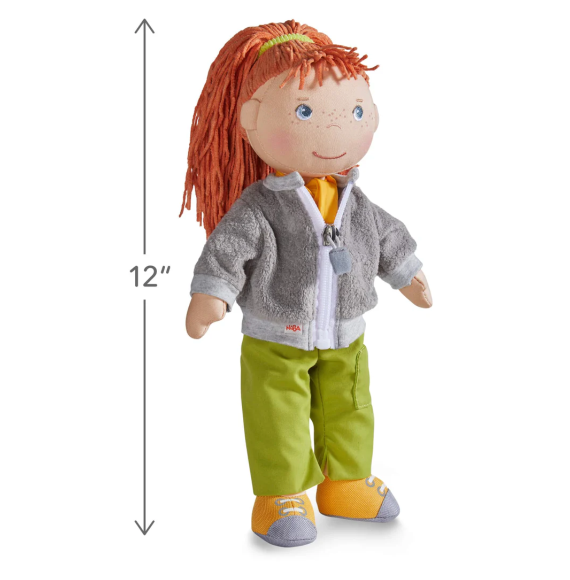 Soft Doll | Soley standing 12 inches tall wearing a gray fleece jacket, green pants, and orange hiking shoes.
