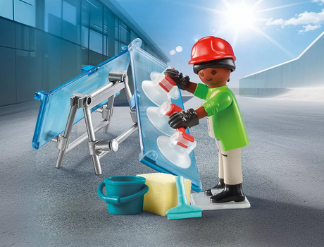 Special Plus | Glazier figure installs glass panes using suction handles with cleaning accessories in a sunny outdoor setting.