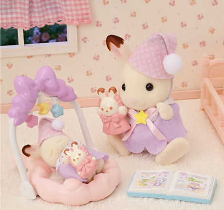 Sleepy Dream Siblings set with Chocolate Rabbit in nightgown, baby sleeping, baby gym, puppet, and bedtime story book.