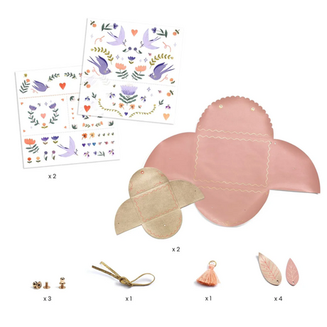 DIY Sweet Fashionista Pouches kit with faux leather pieces, decals, clasps, pompom, and wrist strap for kids' crafts.