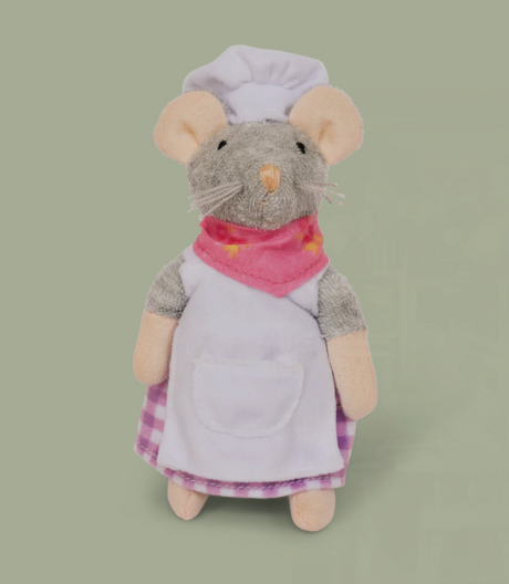 Sam & Julia | The Baker plush mouse wearing a dress, baker's hat, apron, and red scarf on green background.