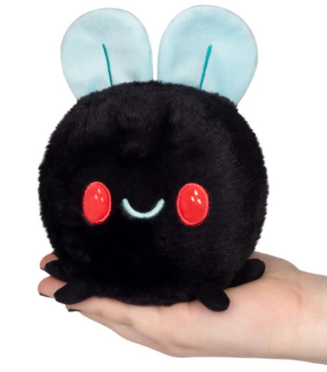 Fly Snackers plush toy with soft black body, blue wings, and red cheeks, perfect for cuddling and imaginative play.
