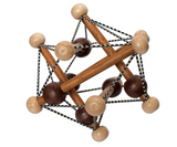 Skwish | Artful wooden infant toy with elastic strings and beads for sensory play and motor skill development.