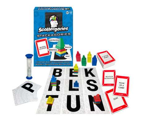 Scattergories Stackagories game set with category cards, stacking pieces, letter cards, and timer on a white background.