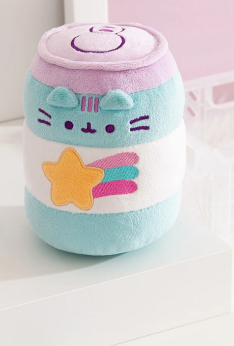 Pusheen Gamer Pop Sip plush in blue-and-white can design with yellow shooting star and purple facial details.