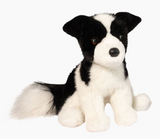 Soft plush Border Collie dog with black and white fur, floppy paws, and a weighted bottom for sitting or cuddling.