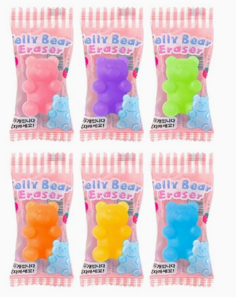 Six colorful gummy bear-shaped erasers individually wrapped in pastel pink gingham packaging with Jelly Bear Eraser label