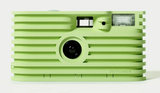 Green FOTOFOTO disposable camera made from recycled materials with automatic flash and retro design