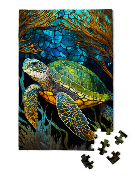 Colorful stained glass sea turtle swimming underwater among coral, shown as a completed 150-piece puzzle.