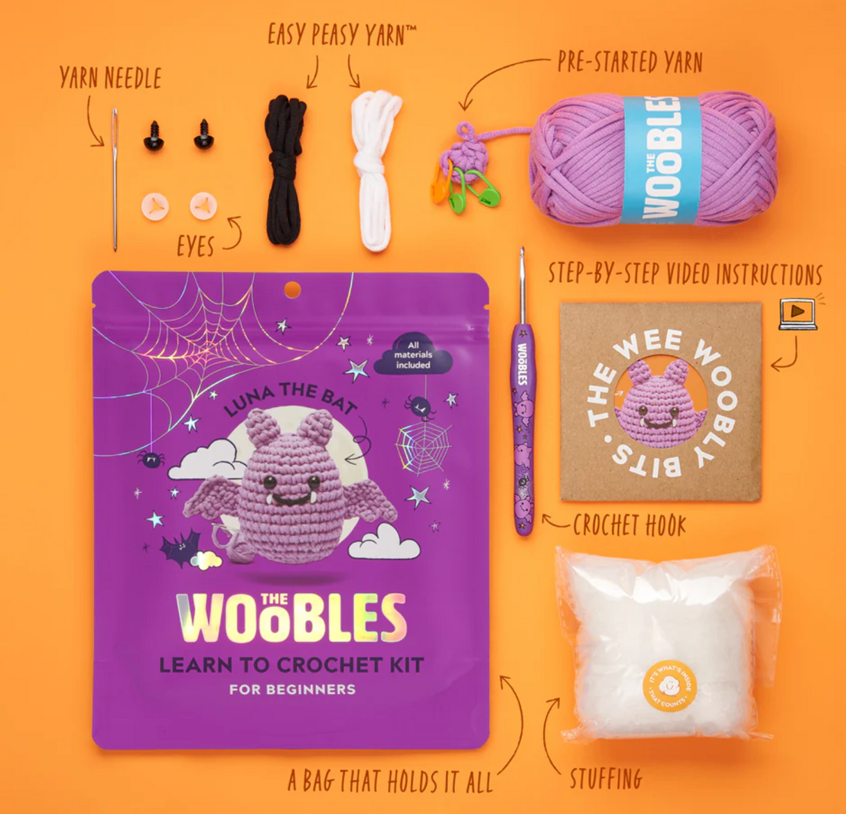 Beginner crochet kit with purple yarn, plastic eyes, stuffing, ergonomic hook, and step-by-step video for Luna the Bat.