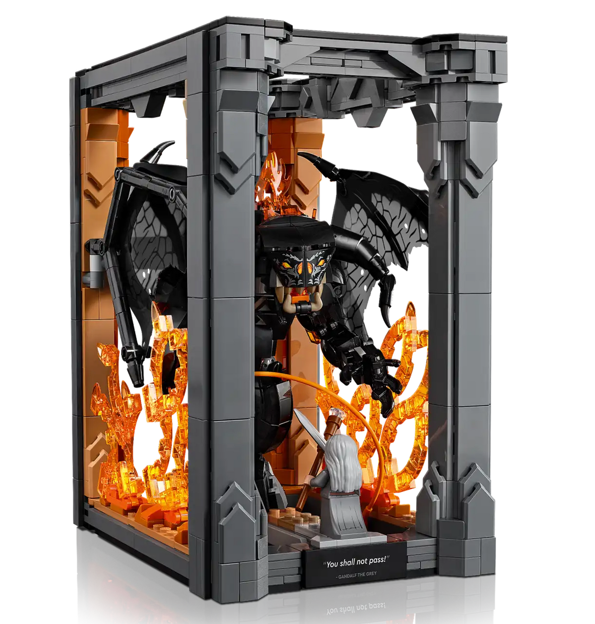 LEGO display of Gandalf facing the Balrog with flaming background inside a dark gray archway bookshelf decor.