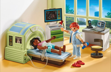 PLAYMOBIL playset showing a doctor examining a child patient undergoing an MRI scan with medical equipment.