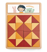Wooden patchwork quilt puzzle with triangular pieces in warm colors and a cheerful morning illustration above