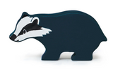 Smooth natural wooden toy shaped like a friendly little badger, perfect for imaginative play and storytelling.