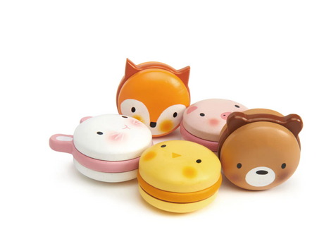 Set of five colorful wooden animal macarons shaped like a fox, bunny, piglet, chick, and bear with playful details.