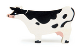 Smooth wooden toy cow with black and white painted details, designed for imaginative play and durability.