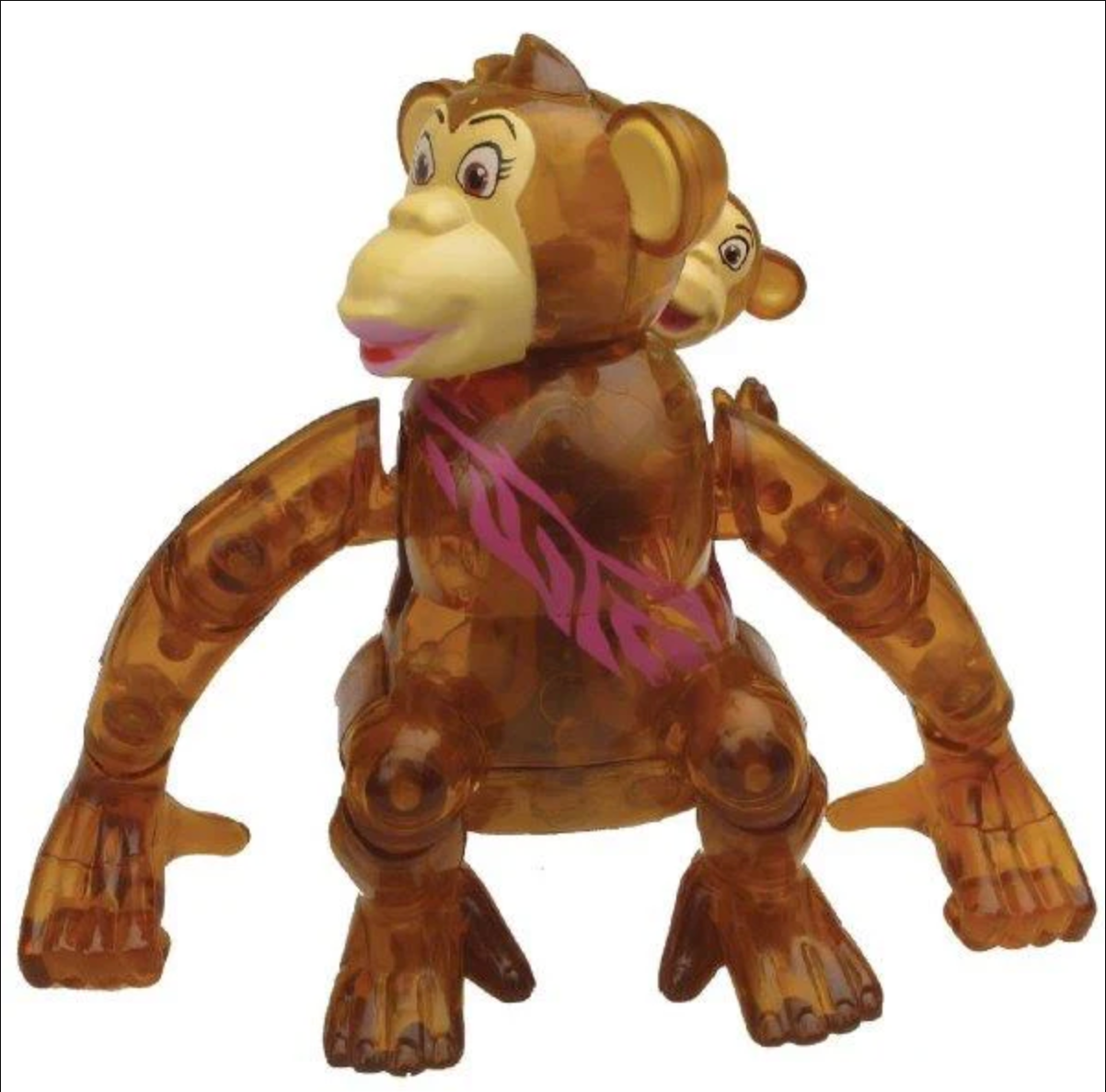 Brown translucent wind-up chimpanzee toy walking sideways with a baby chimp on its back playing peek-a-boo