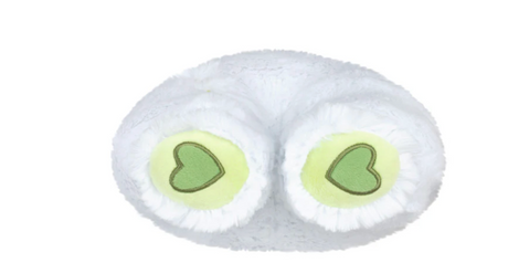 Close-up view of the white Nightcrawler Mini plush toy with green heart-shaped eyes on a plain background