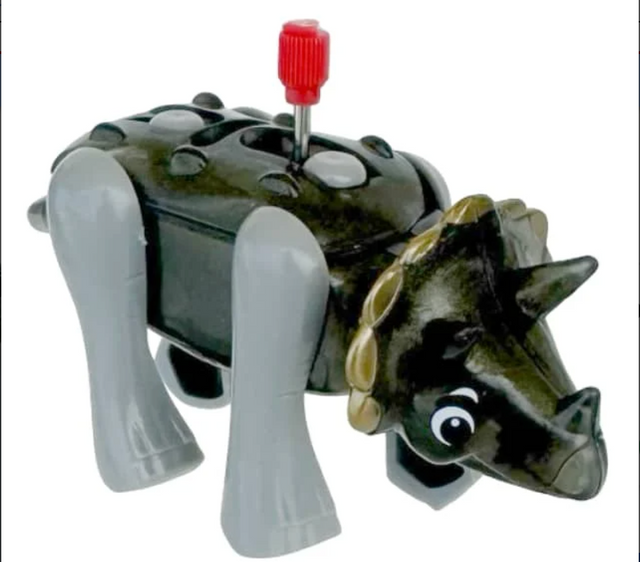 Wind-up toy dinosaur with a black body, gray legs, red knob, nodding head, and swinging tail for kids ages 3 and up