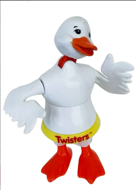 White duck wind-up toy with orange beak and feet twisting its body and flapping wings in playful dance pose