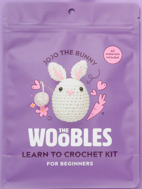 Purple pouch packaging of a beginner crochet kit featuring Jojo the Bunny with all materials included for easy crafting.