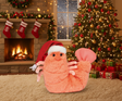 Plush shrimp toy wearing a red Santa hat with soft orange and pink textured body and twinkling black eyes