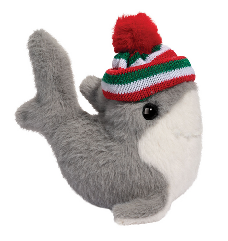 Gray and white plush baby shark wearing a red, green, and white striped winter hat with a pom-pom on top