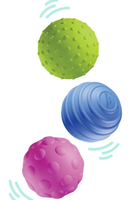 Three colorful sensory bath balls with different textures designed for playful rattling and easy handling.