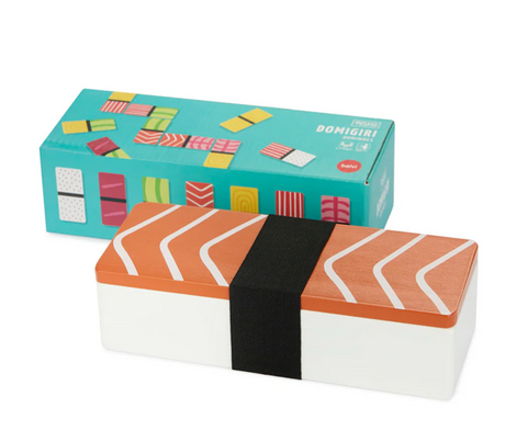 Wooden domino game set styled as sushi nigiri with colorful rectangular pieces in a salmon nigiri-shaped box and packaging.