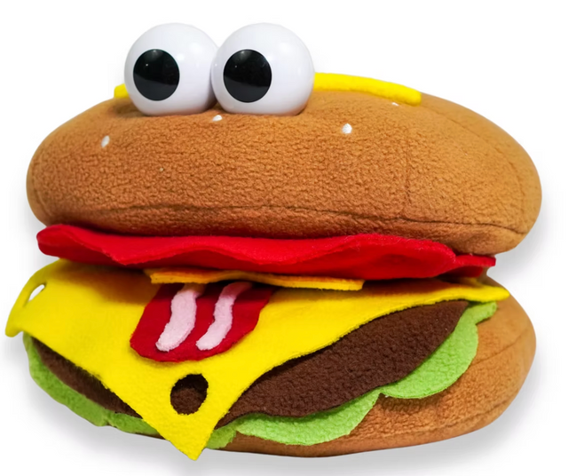 Soft plush hamburger puppet with large eyes, gooey cheese eyebrows, and a playful bacon tongue sticking out.