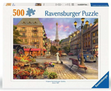 Ravensburger 500 piece puzzle featuring a charming Paris street scene with the Eiffel Tower at sunset.