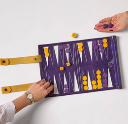 Compact purple and yellow portable roll-up backgammon set with dice and snap closures for easy travel and play anywhere