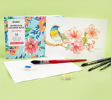 Watercolor coloring book with floral designs, paintbrushes, and a painted bird on a branch on a light green background