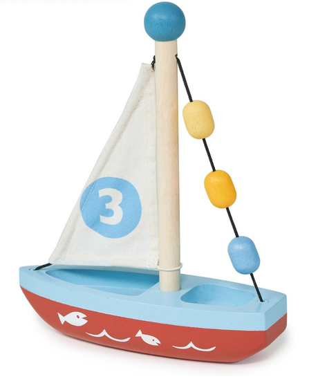 Wooden sailing boat toy with blue and red hull, white sail printed with number three, and colorful bead decorations