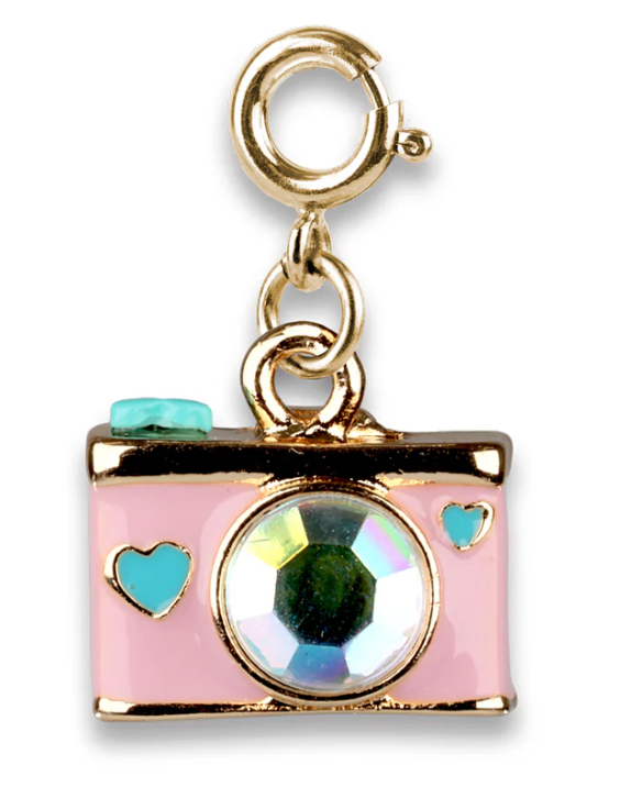 Gold camera charm with sparkling lens and turquoise heart details, perfect for adding a playful touch to any accessory collection