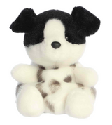 Plush puppy with black floppy ears and white spotted body sitting with an eager and playful expression.