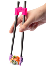 Hand holding black chopsticks with pink tentacle grips picking up a piece of sushi against a white background
