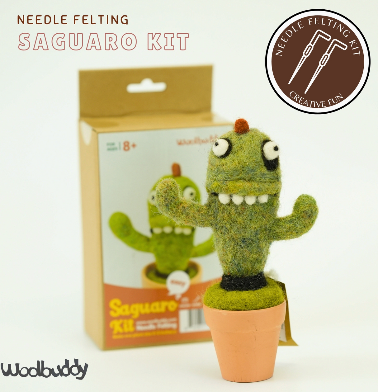 Needle felting kit featuring a cute green monster cactus with expressive eyes in a small terracotta pot.