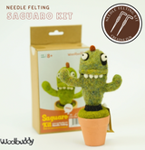 Needle felting kit featuring a cute green monster cactus with expressive eyes in a small terracotta pot.