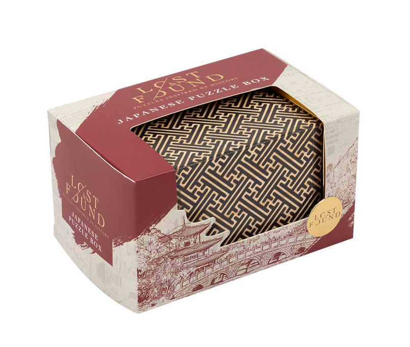 Decorative Japanese puzzle box with intricate geometric pattern in a vintage-style Lost & Found packaging box