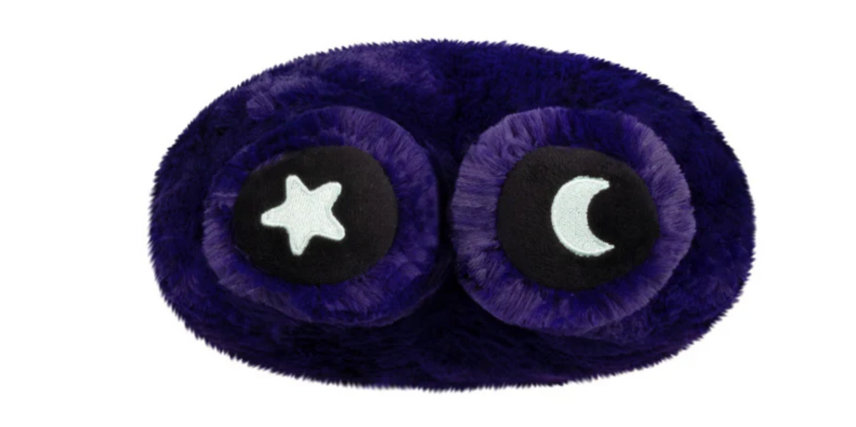 Soft midnight blue sleep mask with plush texture featuring star and crescent moon designs on eye covers