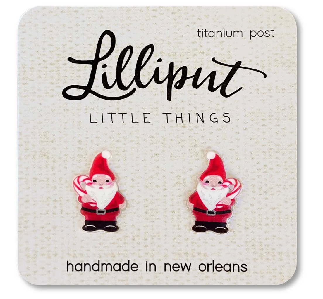 Pair of handmade Santa Gnome stud earrings with red hats and candy canes on a branded display card