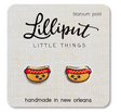 Cute kawaii hot dog stud earrings with titanium posts on a branded display card, handmade in New Orleans