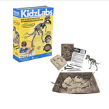 T-Rex dig kit with excavation tools, fossil blocks, digging tray, and assembled dinosaur skeleton model for kids.