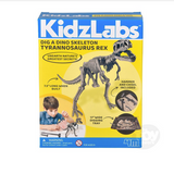 Box of KidzLabs T-Rex dig kit with dinosaur skeleton model and tools for excavation activity targeted at children aged 8 and up
