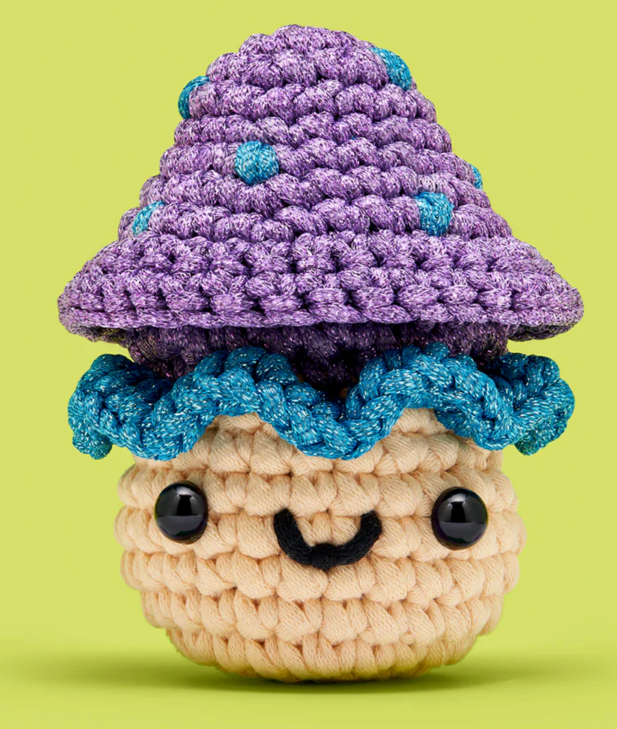 The Woobles Crochet Kit | Irving the Mushroom crocheted mushroom with purple cap and smiling face